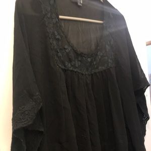 Poncho top black size small with lace detailing